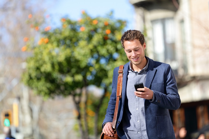 Realtor reading a message from a client